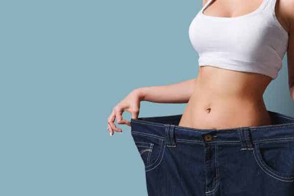 woman after fat reduction treatment Ealing