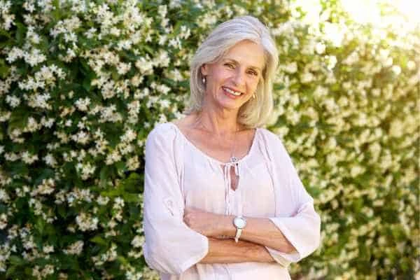 Older woman happy with urinary incontinence treatment Ealing